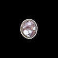 Sterling silver ring with a white buffalo stone design on a black background