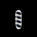 Vertically set ring with black stones set in sterling silver on black background
