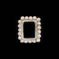 Decorative silver frame of black onyx ring on a black background