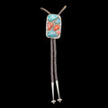 Bolo tie with colorful stone design on a black background