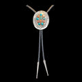 Silver bolo tie with turquoise, coral and shell on a black background