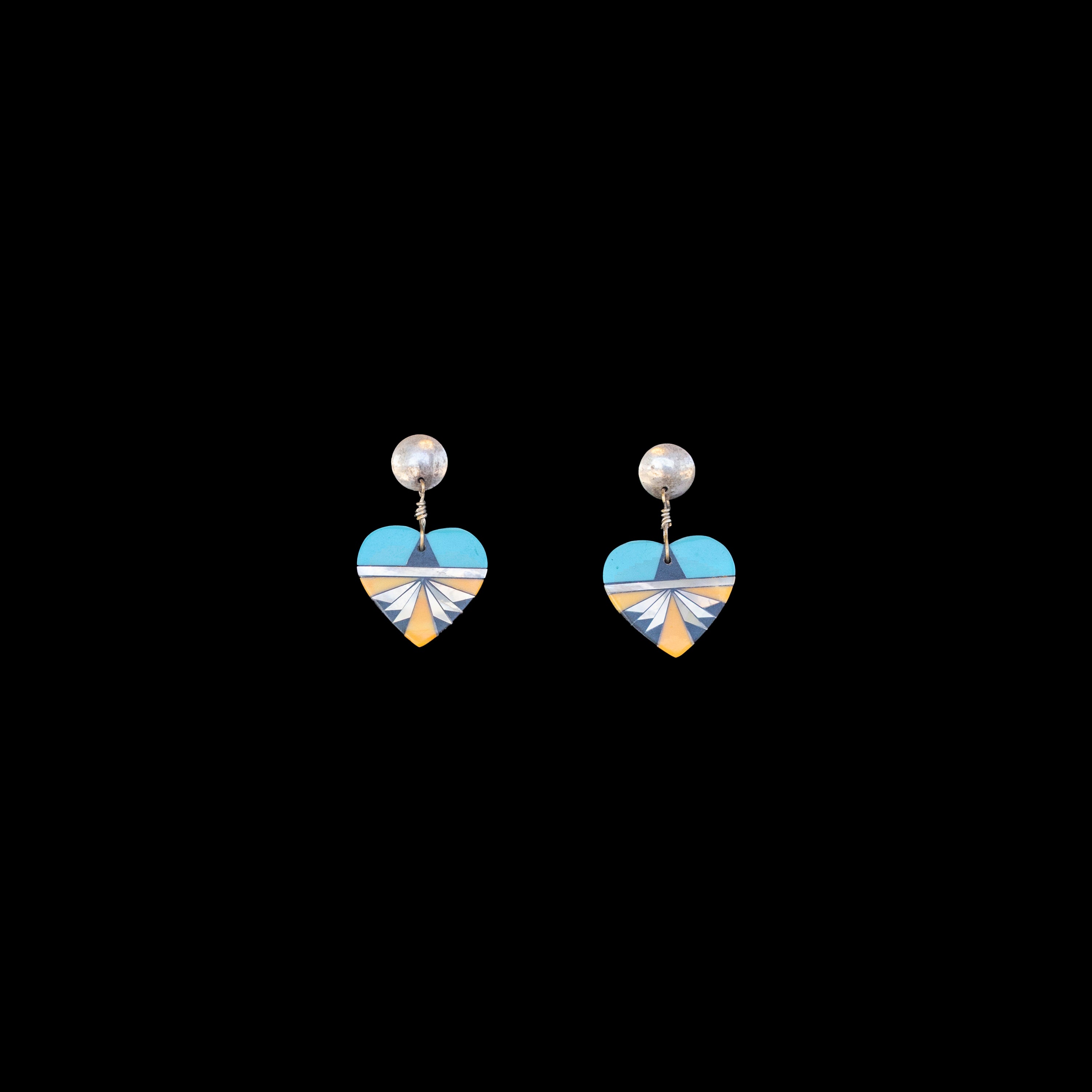 Heart-shaped Navajo earrings with turquoise and coral
